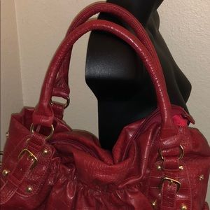 RED leather medium size purse. New w out tags. Beautiful rich soft leather! Hot